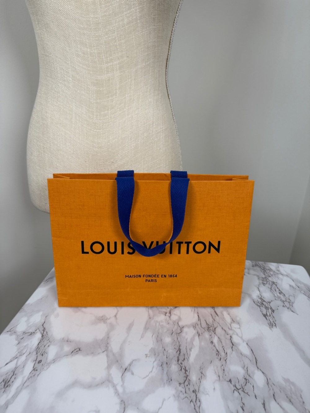 Authentic Louis Vuitton Orange Paper Shopping Bag with Blue Handles
